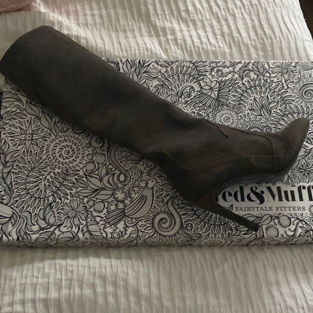 Narrow calf tan boots. Never worn